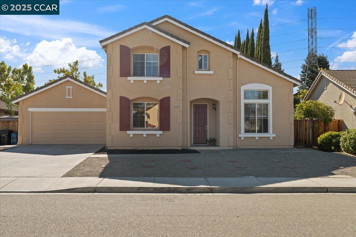 4651 Shetland Way Antioch, CA 94531 - Photo 33 of 34 a front view of a house with a yard