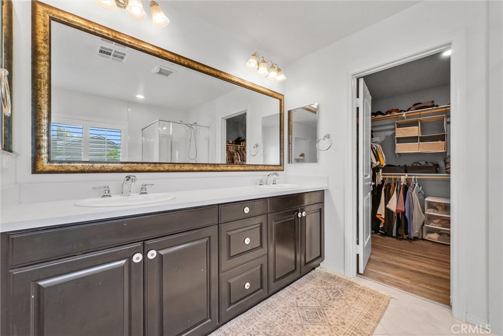 37656 Needlegrass Road Murrieta, CA 92563 - Photo 23 of 29 Primary bathroom with double vanity.