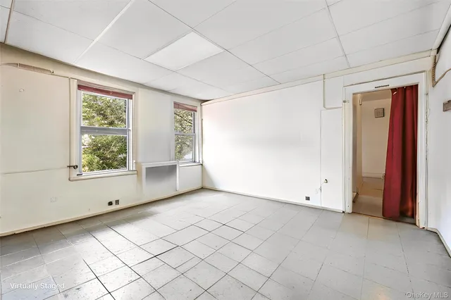 an empty room with windows