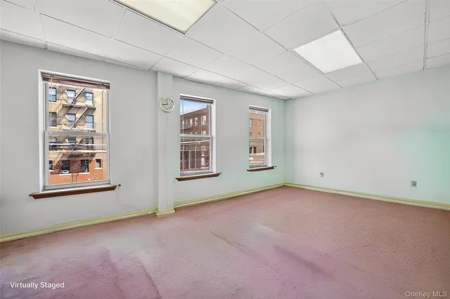 an empty room with windows