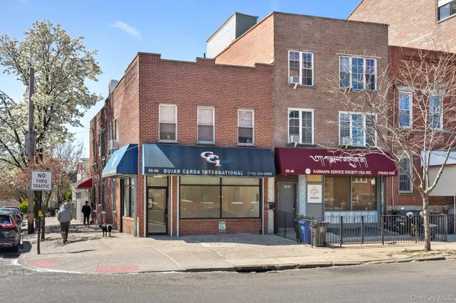 a view of a building with a street