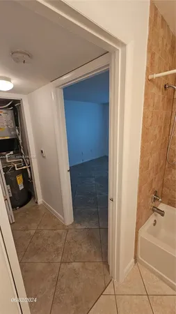 a bathroom with a sink and a shower