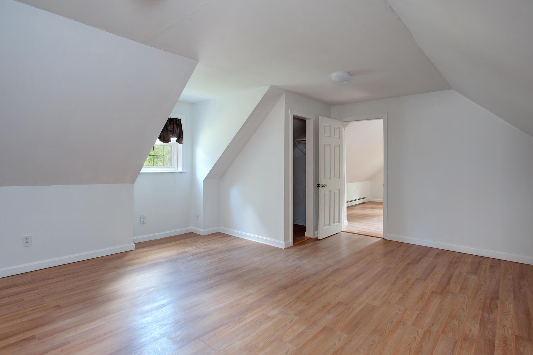 55 Edgewater Road Mashpee, MA 02649 - Photo 12 of 21 an empty room with wooden floor and windows