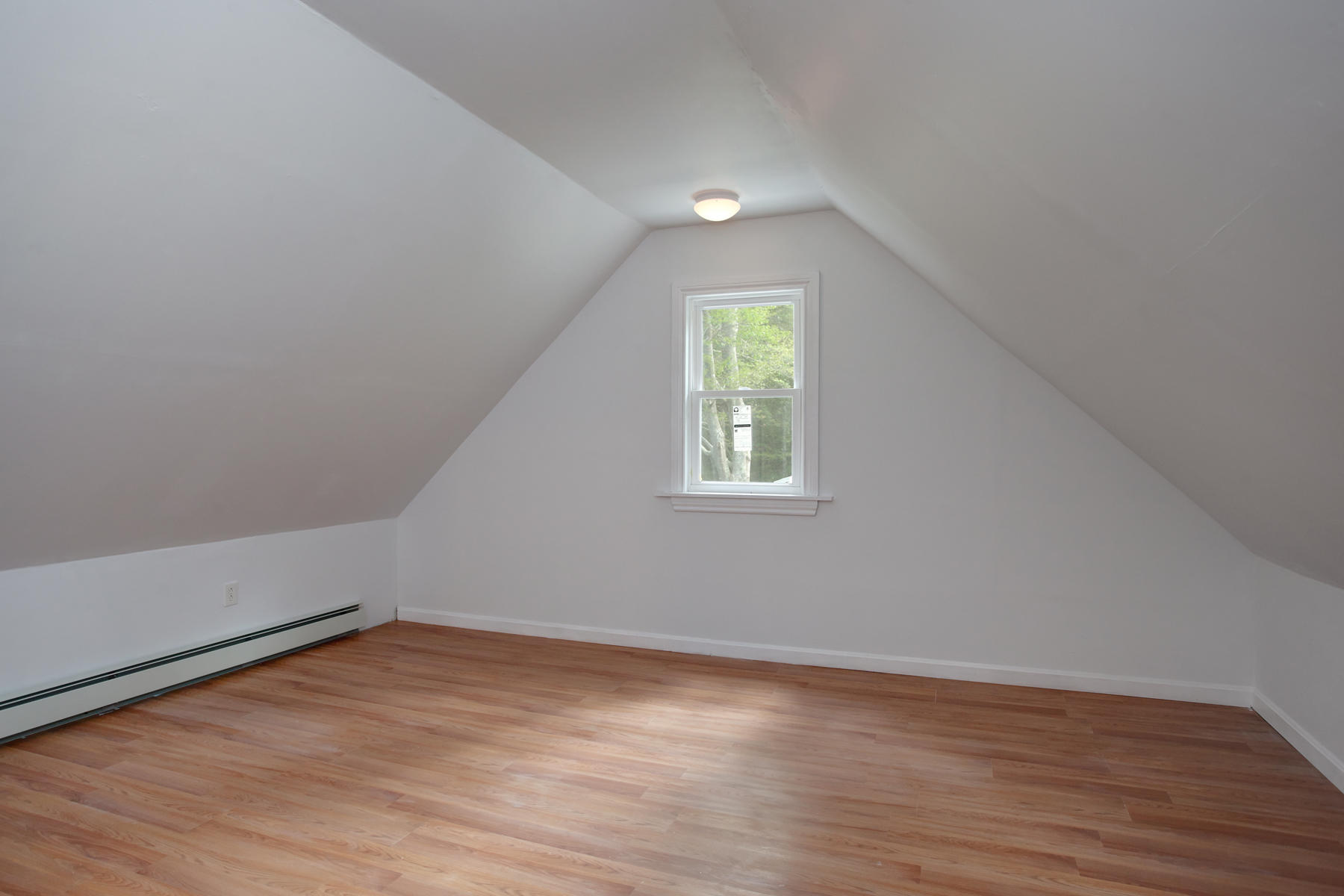 55 Edgewater Road Mashpee, MA 02649 - Photo 13 of 21 an empty room with wooden floor and windows