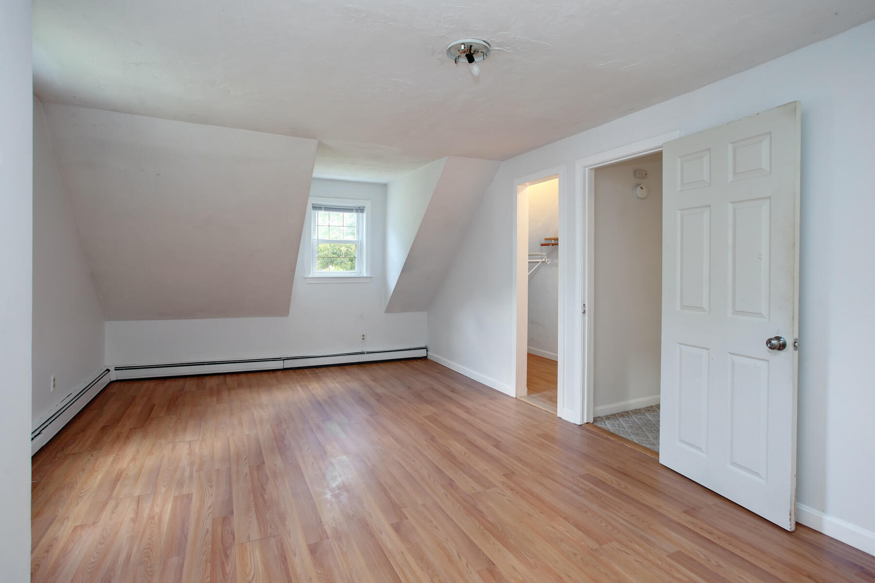55 Edgewater Road Mashpee, MA 02649 - Photo 14 of 21 an empty room with wooden floor and windows