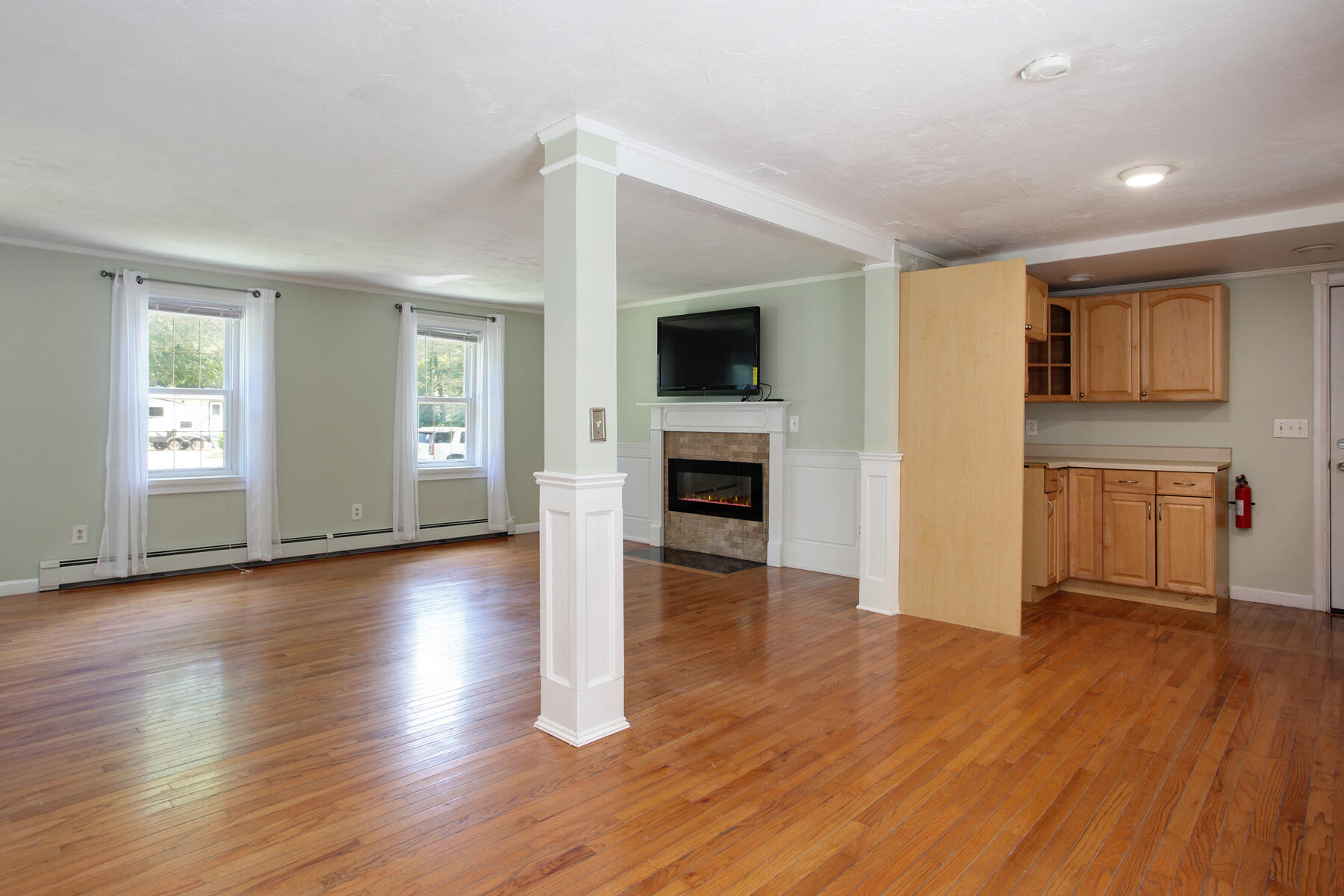 55 Edgewater Road Mashpee, MA 02649 - Photo 7 of 21 a view of a livingroom with wooden floor