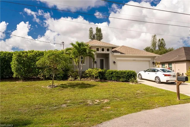 a front view of a house with swimming pool