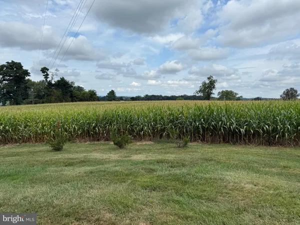 a view of a lake with outdoor space