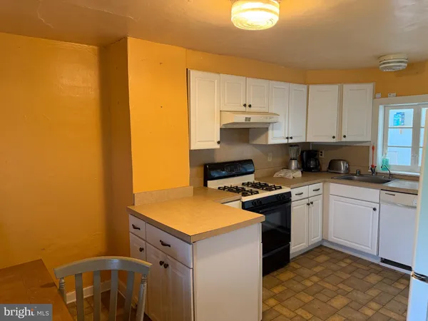 a view of a hallway with a glass door