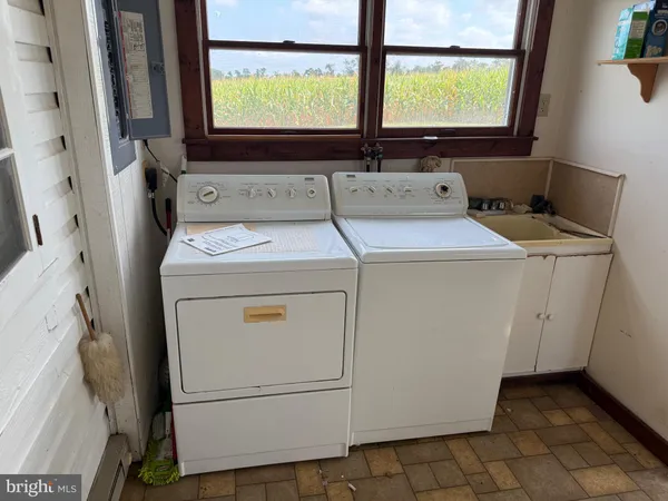 a bathroom with a sink and mirror