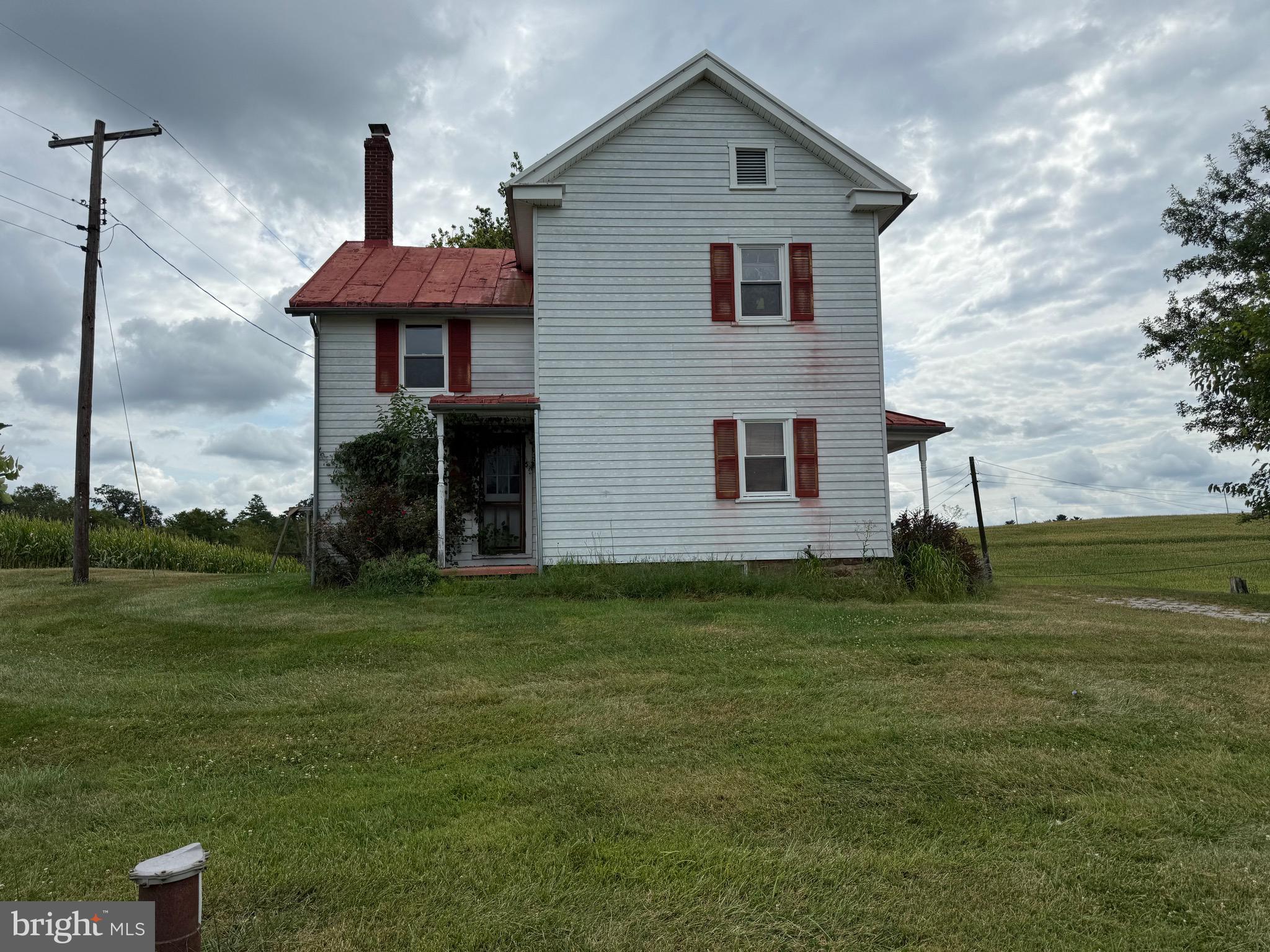1309 Trevanion Road Union Bridge, MD 21791 - Photo 4 of 70 a front view of a house with a yard