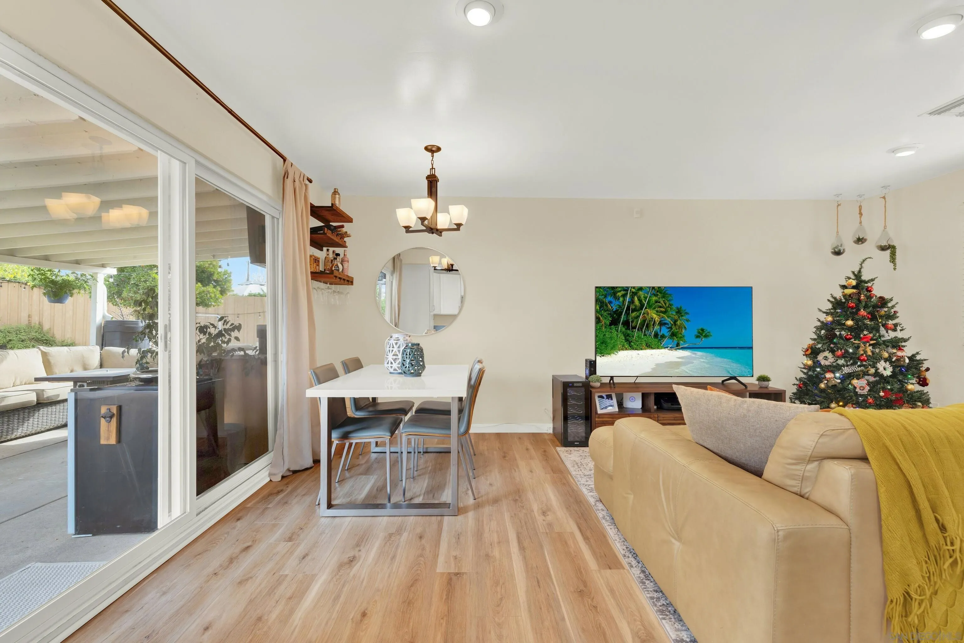 9515 Domer Road Santee, CA 92071 - Photo 13 of 45 a view of a dining room with furniture window and wooden floor