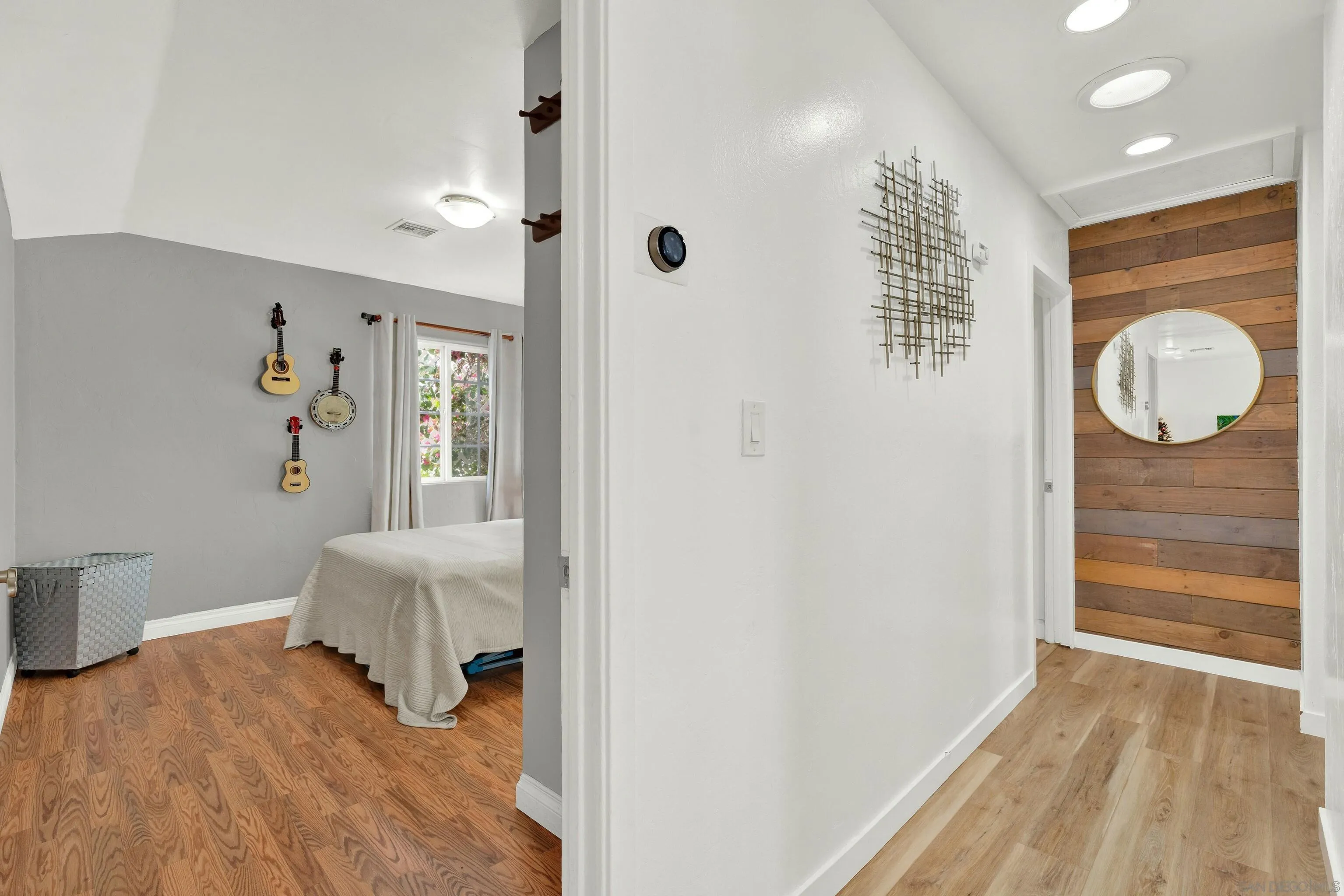 9515 Domer Road Santee, CA 92071 - Photo 21 of 45 a view of a room with wooden floor and furniture