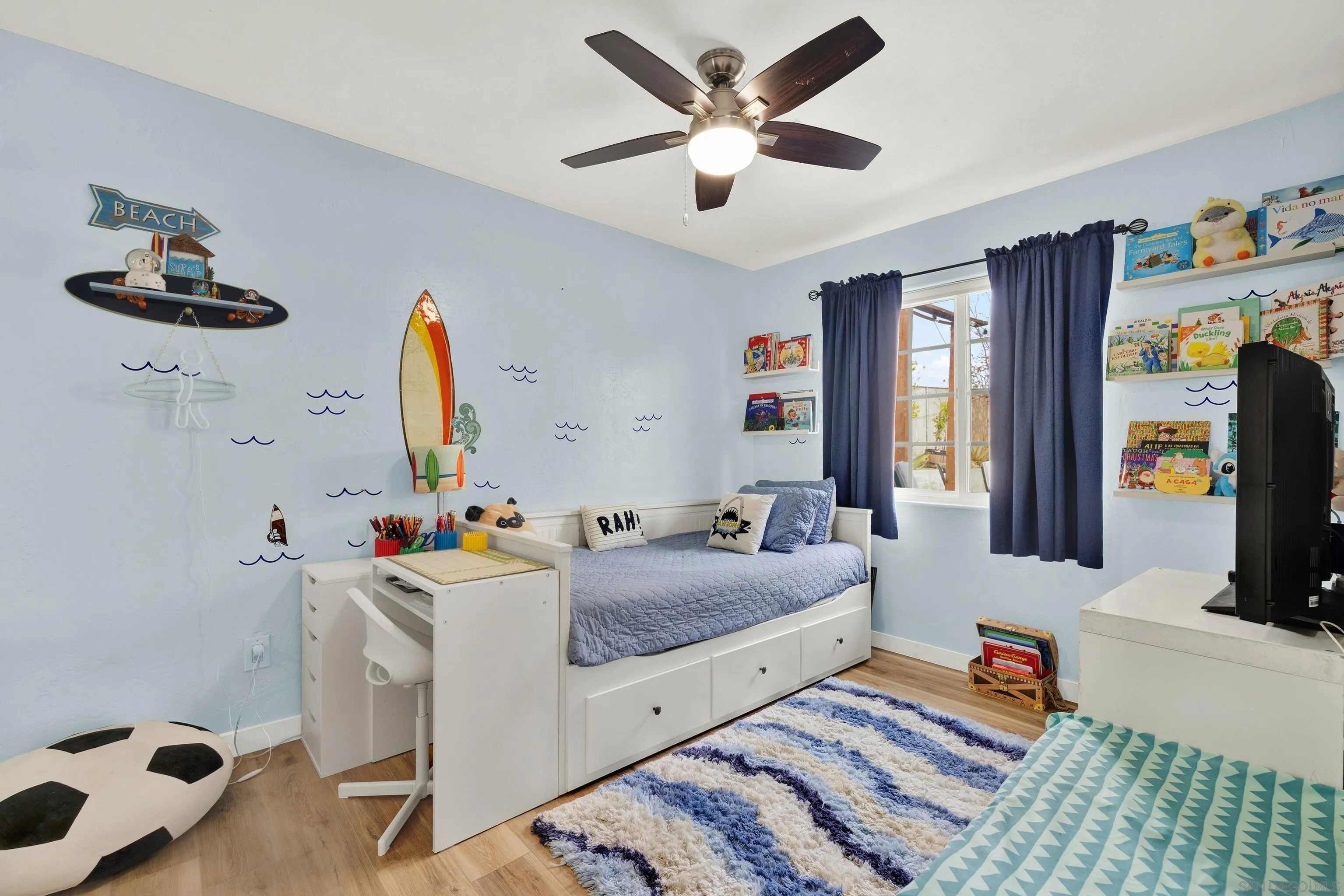 9515 Domer Road Santee, CA 92071 - Photo 27 of 45 a bedroom with furniture and a flat screen tv