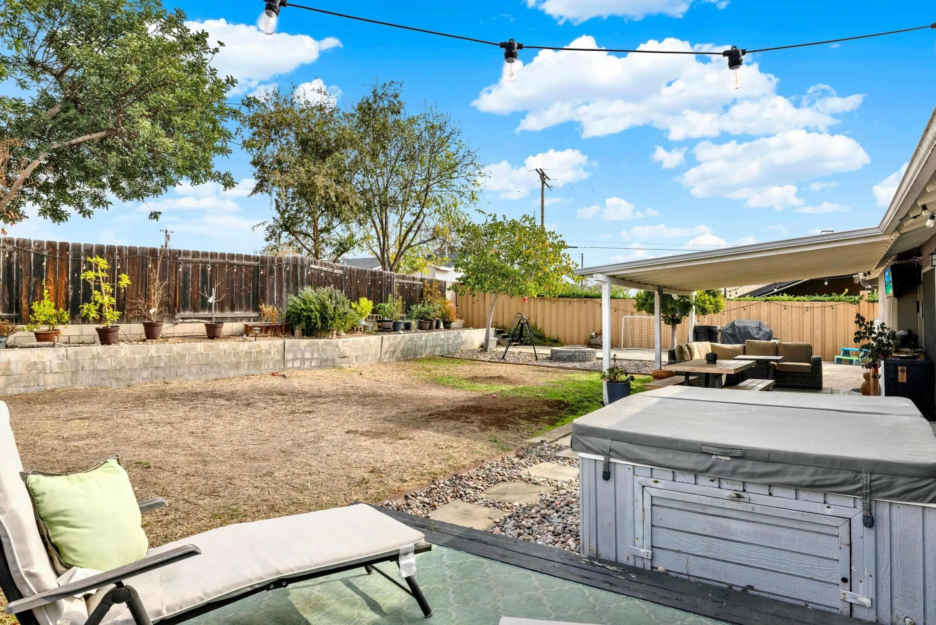 9515 Domer Road Santee, CA 92071 - Photo 35 of 45 a view of a backyard with table and chairs