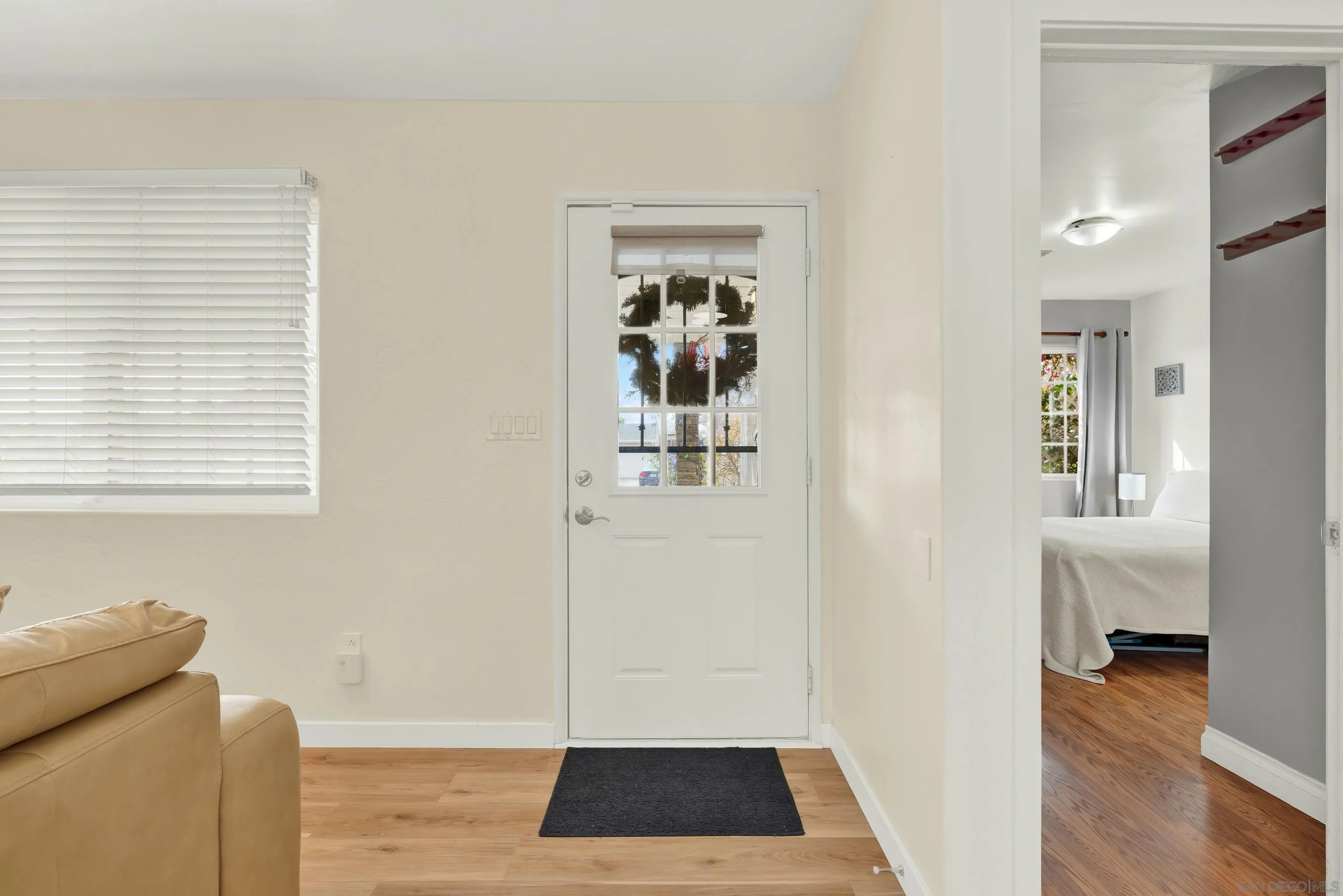 9515 Domer Road Santee, CA 92071 - Photo 8 of 45 a view of room with window and wooden floor