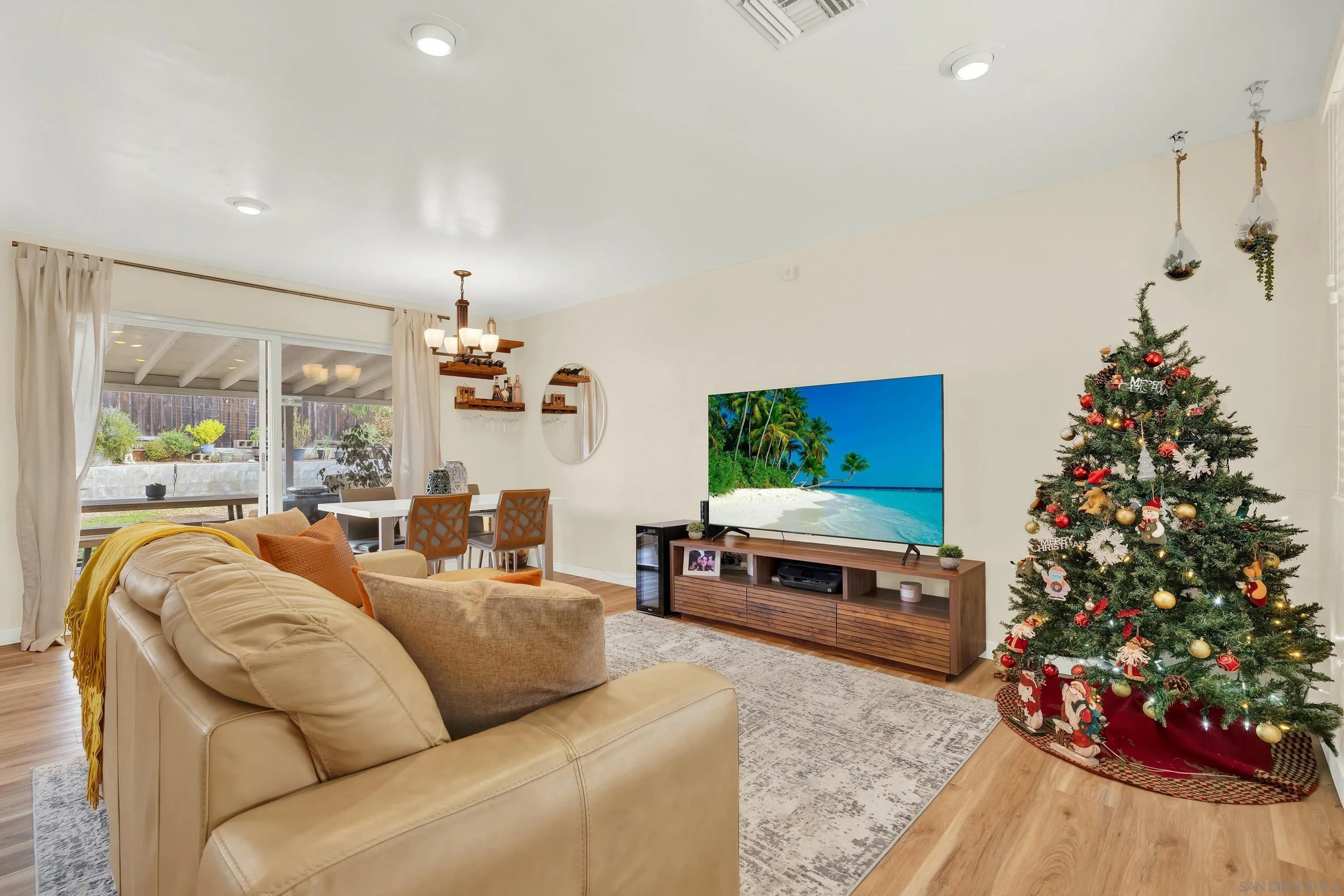 9515 Domer Road Santee, CA 92071 - Photo 9 of 45 a living room with furniture plant and a large window