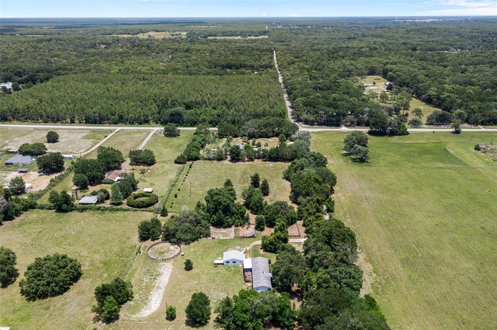 26255 Lambeth Road Brooksville, FL 34601 - Photo 70 of 76 an aerial view of a house with a yard