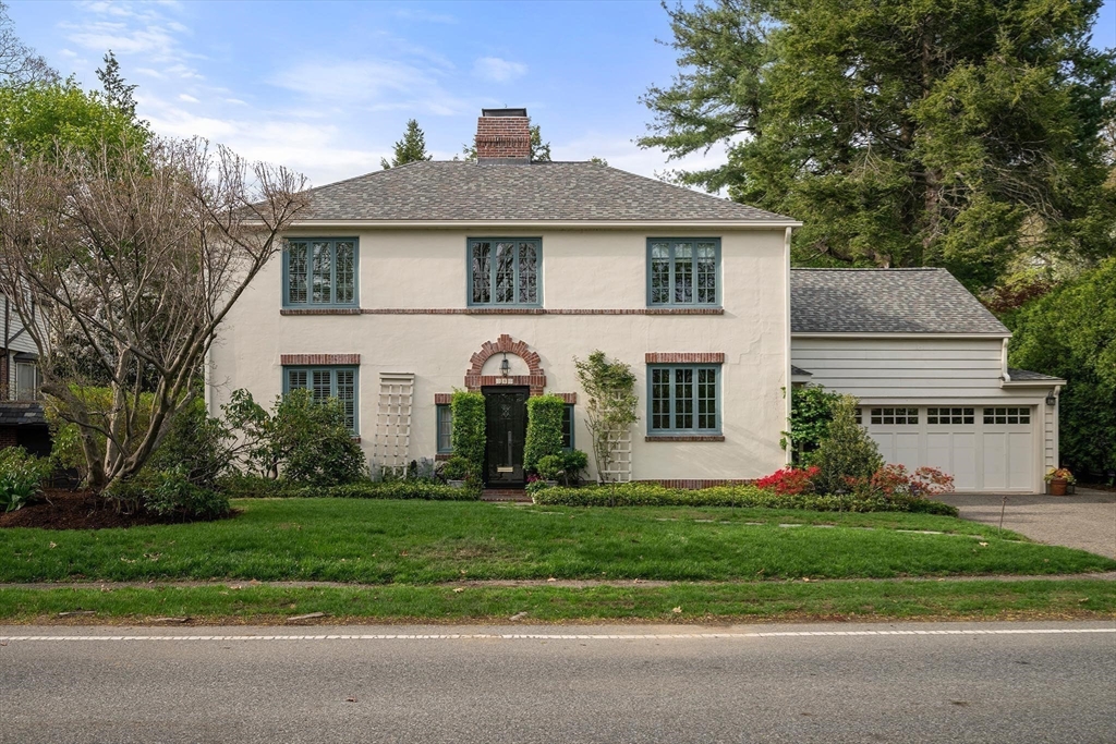 286 Quinobequin Road Newton, MA 02468 - Photo 29 of 31 a front view of a house with a yard
