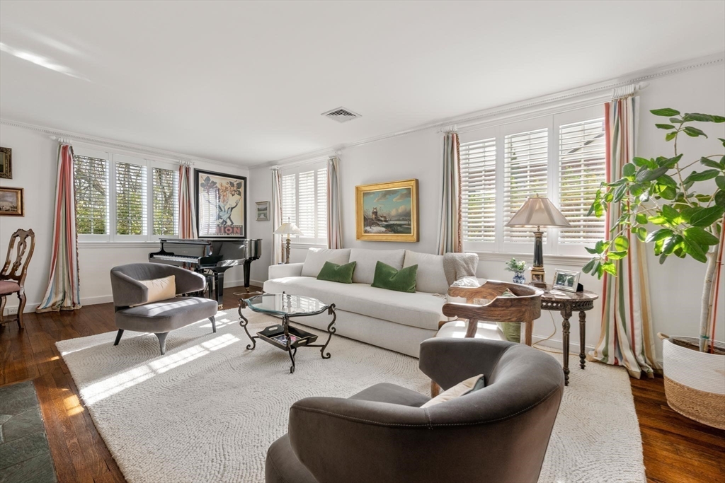 286 Quinobequin Road Newton, MA 02468 - Photo 3 of 31 a living room with furniture and a large window