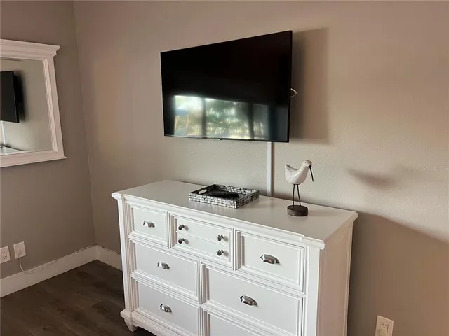 a kitchen with a stove and a microwave