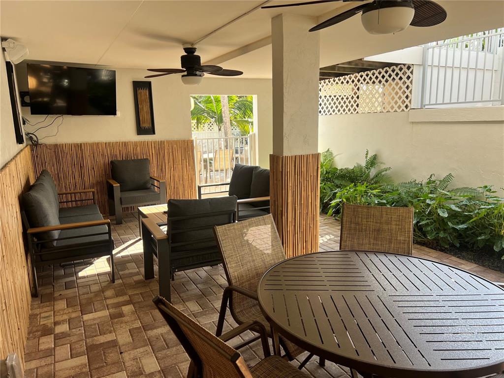 1001 Point Of Rocks Road, Unit 208 Sarasota, FL 34242 - Photo 24 of 33 a outdoor space with furniture