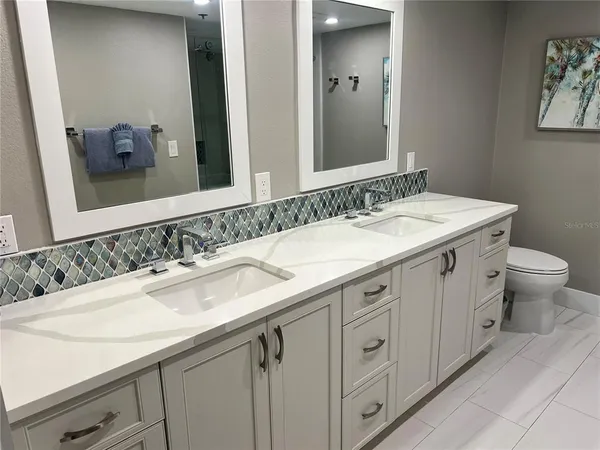 a bathroom with a sink and a toilet