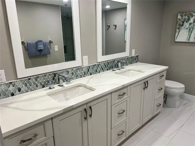 a bathroom with a sink and a toilet
