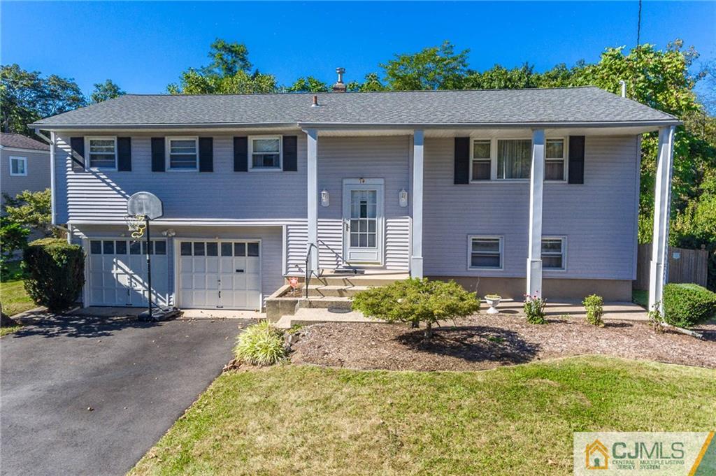 14 Gifford Road Somerset, NJ 08873 - Photo 1 of 25 a view of house with yard