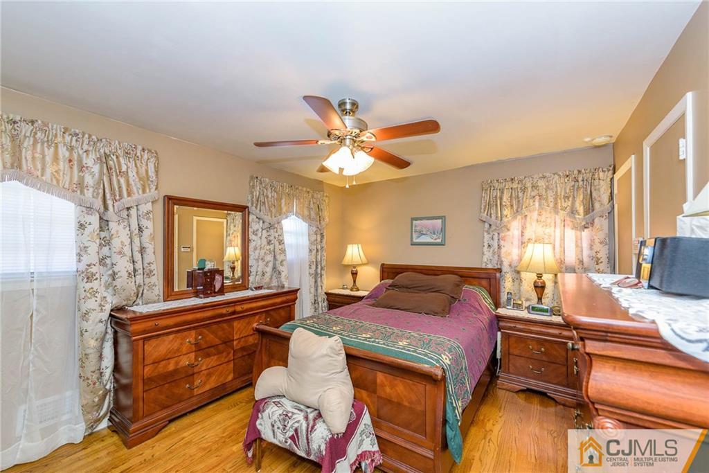 14 Gifford Road Somerset, NJ 08873 - Photo 16 of 25 a living room with furniture and a large window