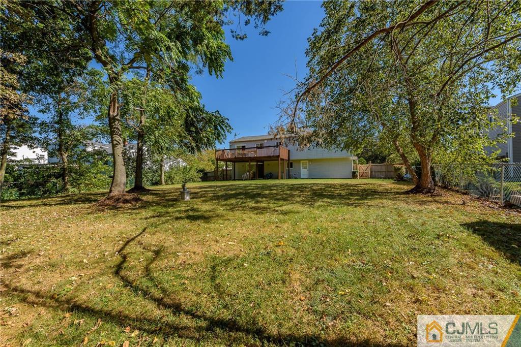 14 Gifford Road Somerset, NJ 08873 - Photo 24 of 25 a house view with swimming pool in front of it