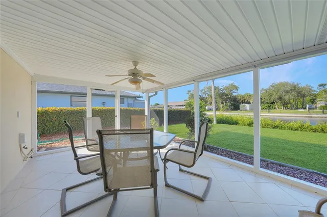 a view of a patio with a backyard