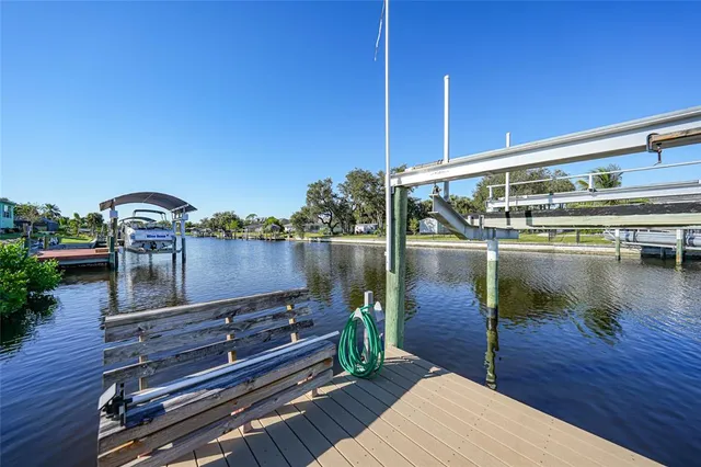 a deck view with a lake view