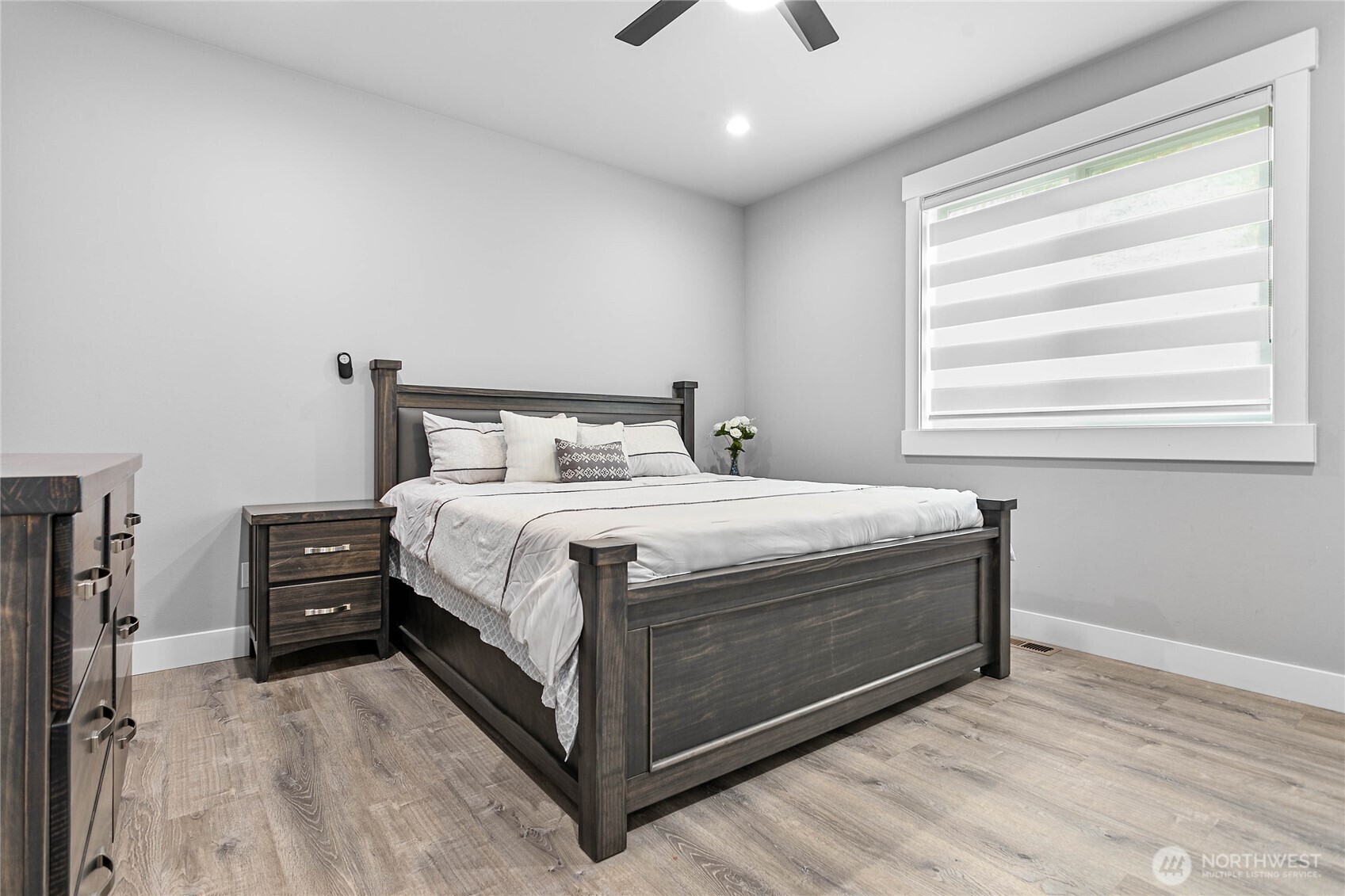 2144 Riverstone Loop Ferndale, WA 98248 - Photo 19 of 36 a bedroom with a bed and a window