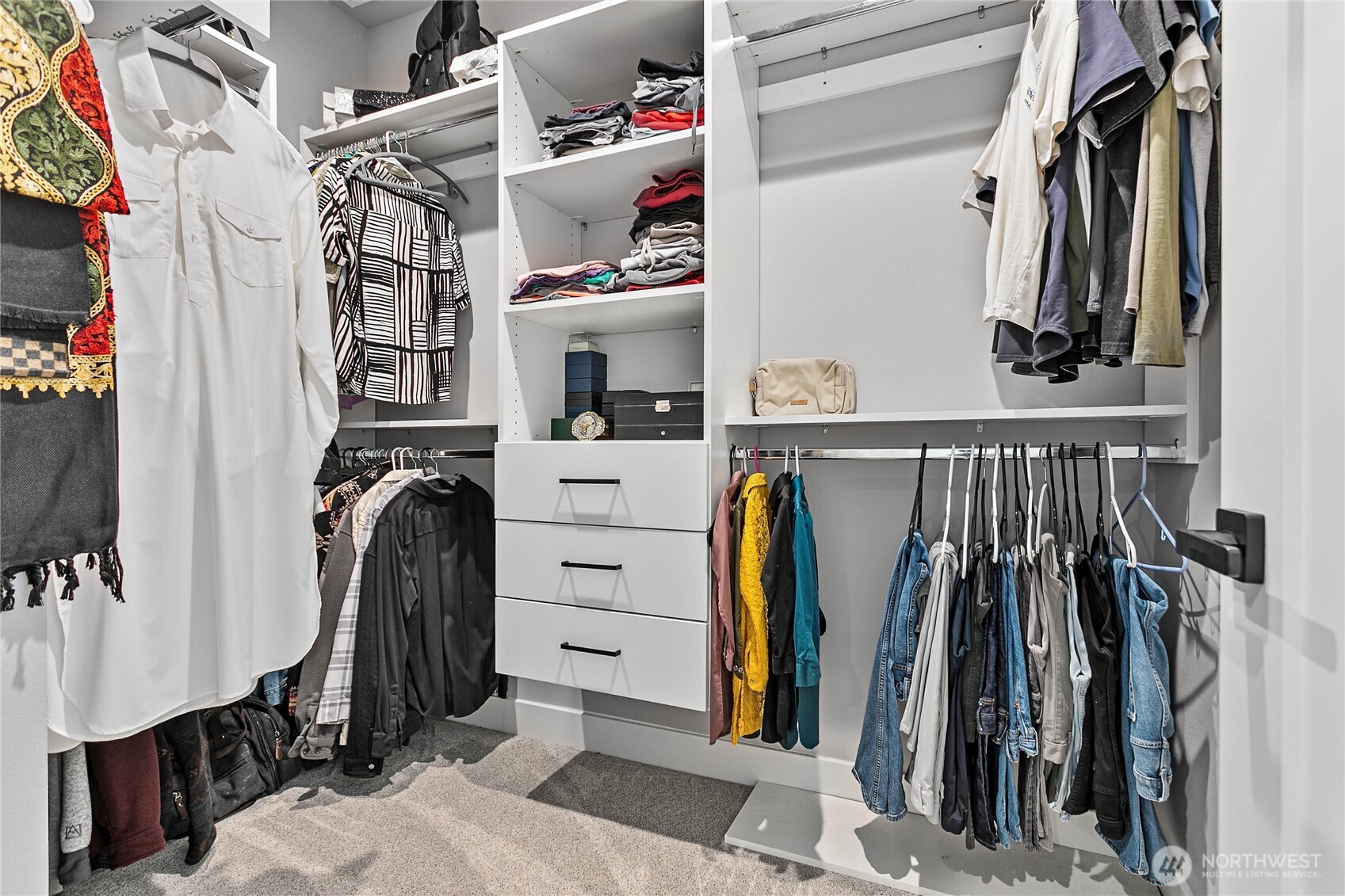 2144 Riverstone Loop Ferndale, WA 98248 - Photo 26 of 36 a view of walk in closet with clothes and shoes