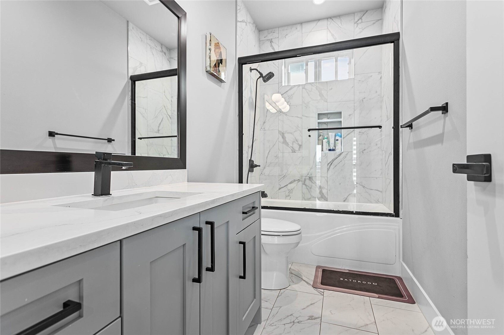 2144 Riverstone Loop Ferndale, WA 98248 - Photo 29 of 36 a bathroom with a granite countertop sink toilet and shower