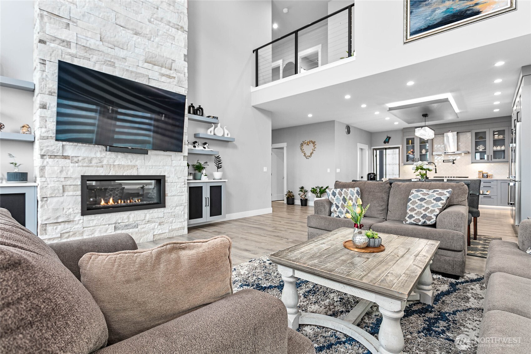 2144 Riverstone Loop Ferndale, WA 98248 - Photo 3 of 36 a living room with furniture and a fireplace
