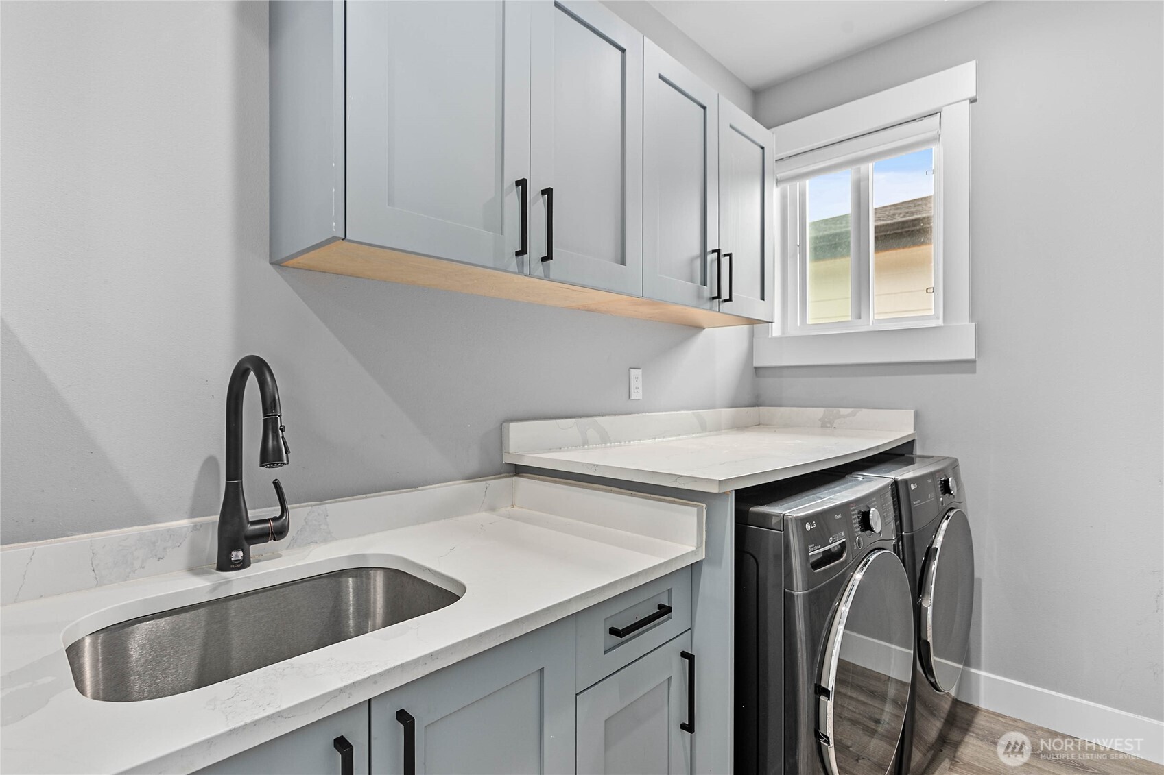 2144 Riverstone Loop Ferndale, WA 98248 - Photo 31 of 36 a view white cabinets and a sink