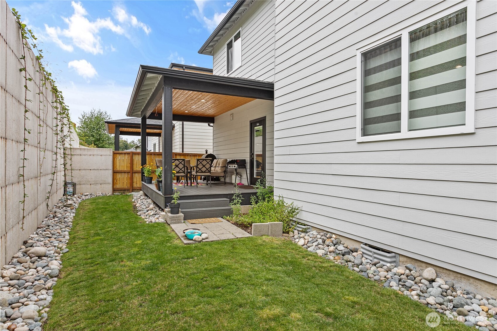 2144 Riverstone Loop Ferndale, WA 98248 - Photo 35 of 36 a view of house with backyard and sitting area