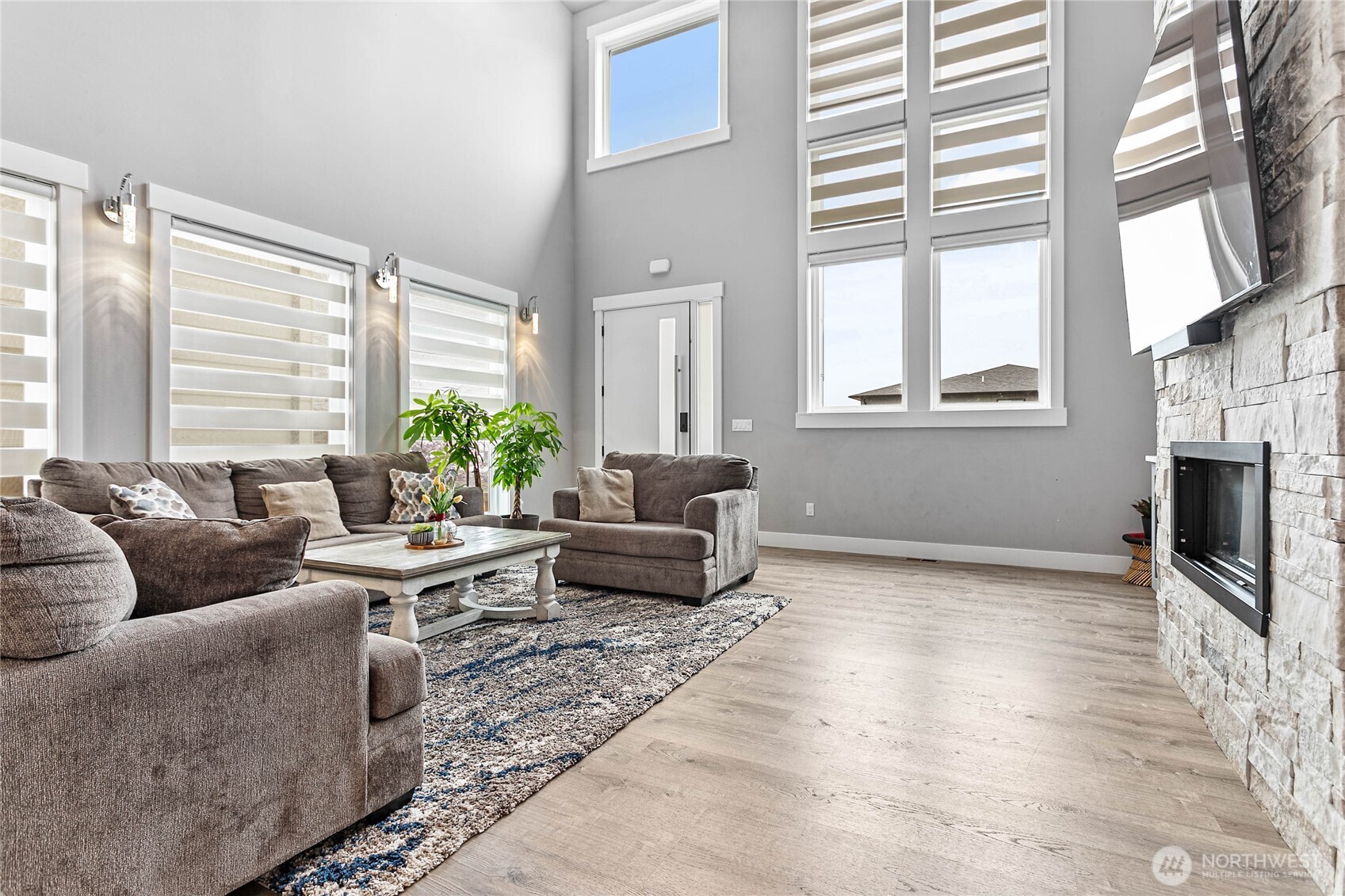 2144 Riverstone Loop Ferndale, WA 98248 - Photo 7 of 36 a living room with furniture and a large window