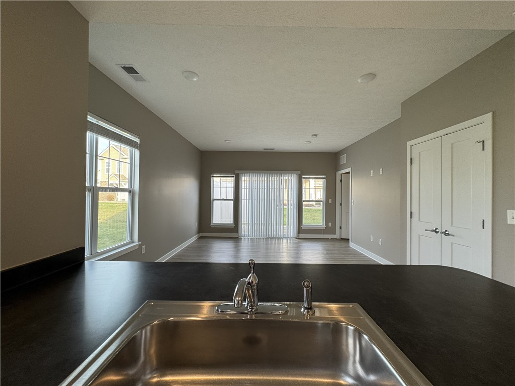 29 Grn Spg Lane Ogden, NY 14624 - Photo 7 of 22 View from kitchen sink towards the dining and livi