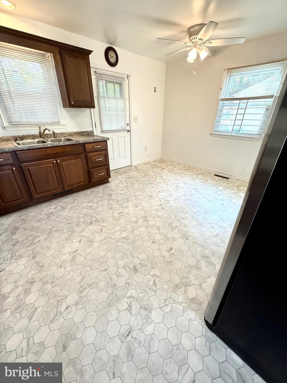 195 Mitscher Road Dover, DE 19901 - Photo 7 of 24 a view of a hallway with front door and windows