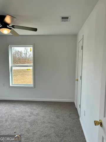 an empty room with a window