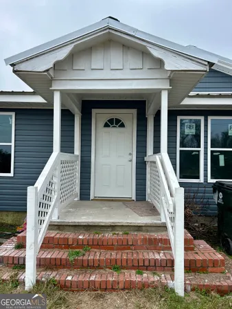 a front view of a house with entryway