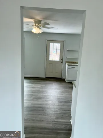 a backyard of a house with lots of green space