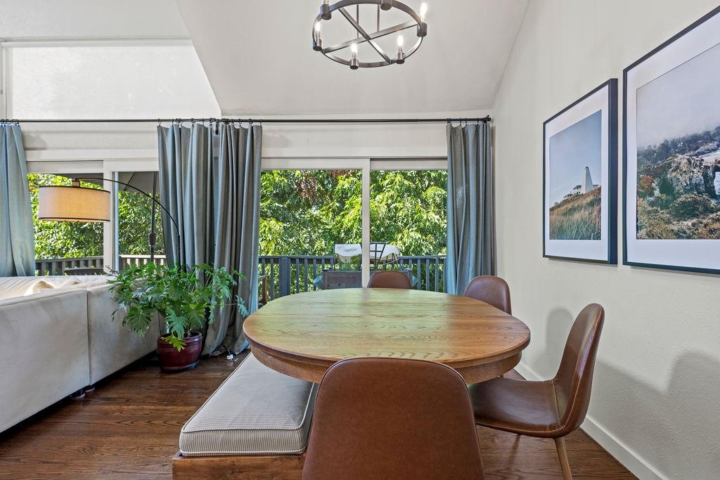 9222 Church Road, Unit 117 Dallas, TX 75231 - Photo 7 of 24 a view of a dining room with furniture window and wooden floor