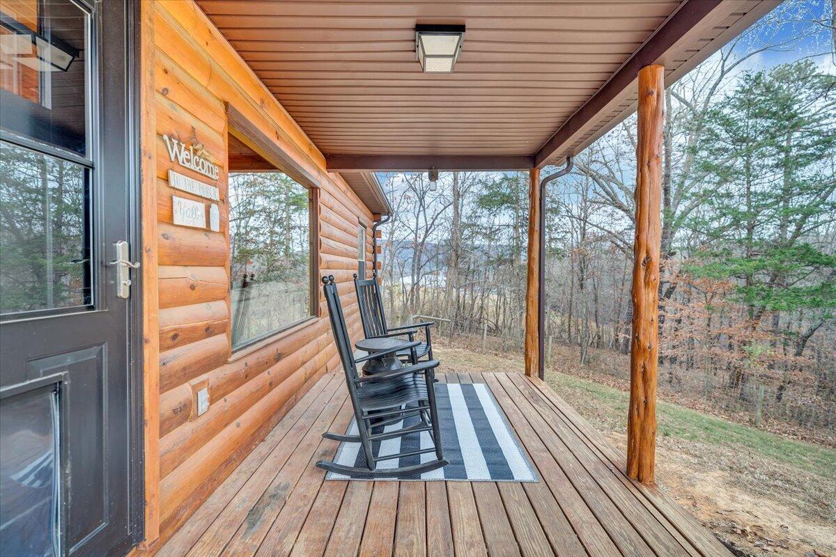 8013 Springwood Road Buchanan, VA 24066 - Photo 12 of 50 a view of balcony with wooden floor and outdoor space
