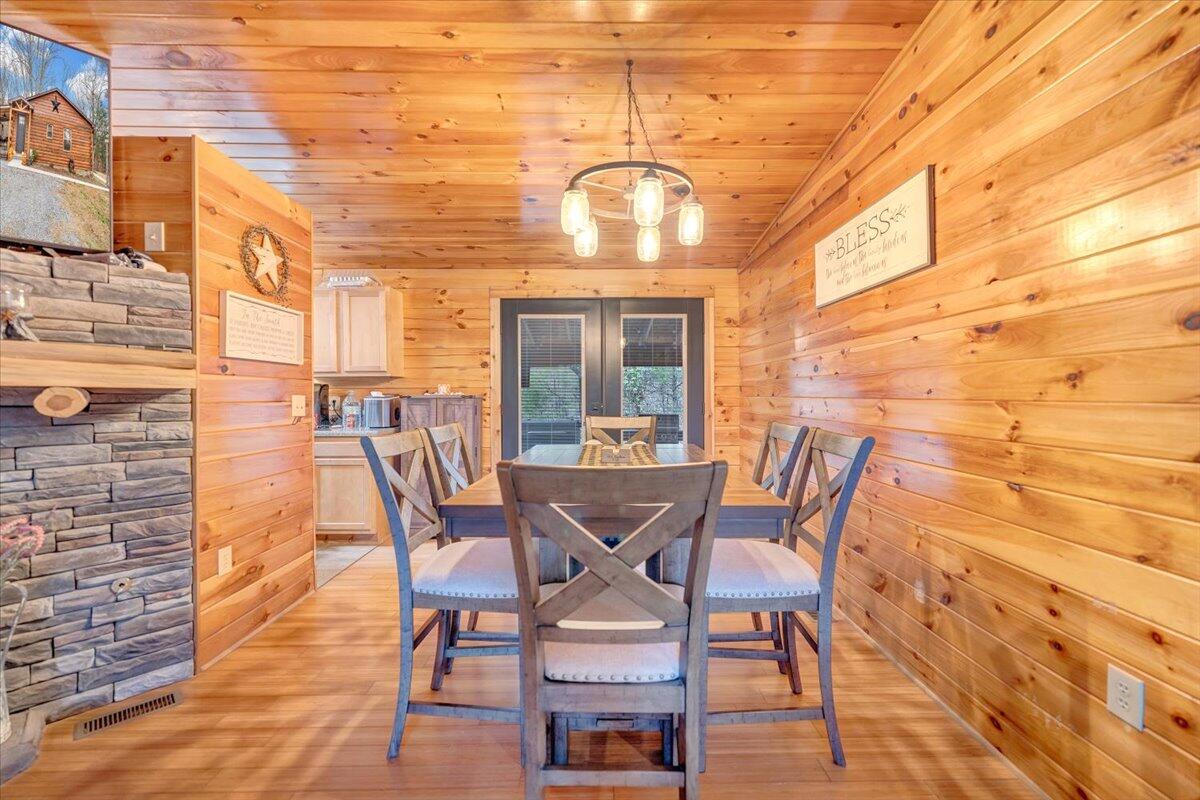 8013 Springwood Road Buchanan, VA 24066 - Photo 19 of 50 a view of a dining room with furniture and wooden floor