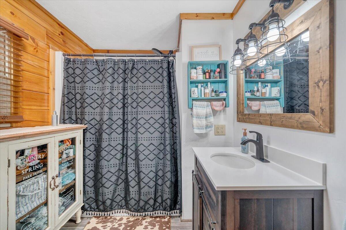 8013 Springwood Road Buchanan, VA 24066 - Photo 29 of 50 a bathroom with a sink and a mirror