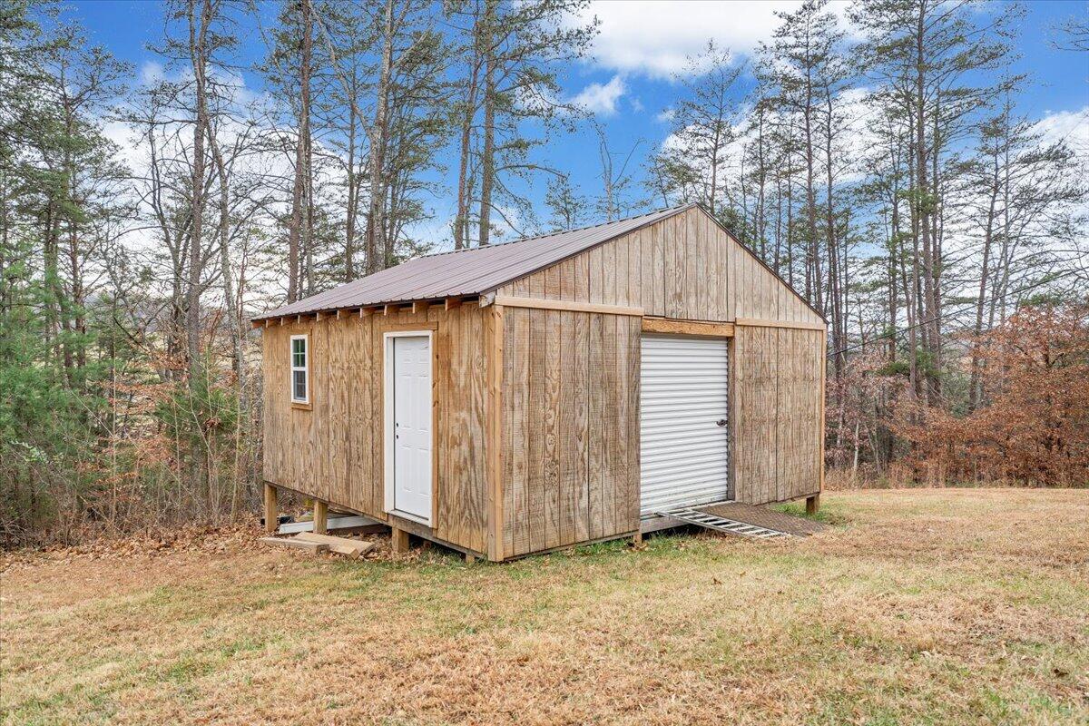 8013 Springwood Road Buchanan, VA 24066 - Photo 40 of 50 a view of a house with a yard
